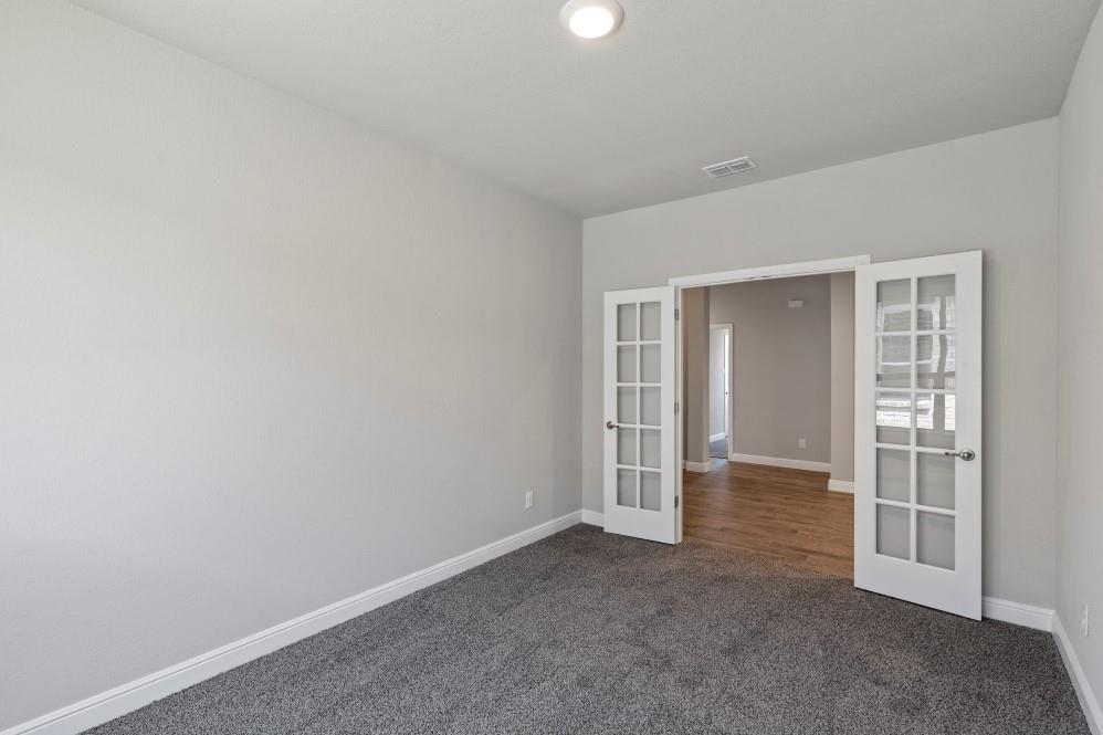 130 Lunayena Road Rhome, TX 76078 - Photo 25 of 39 an empty room with windows