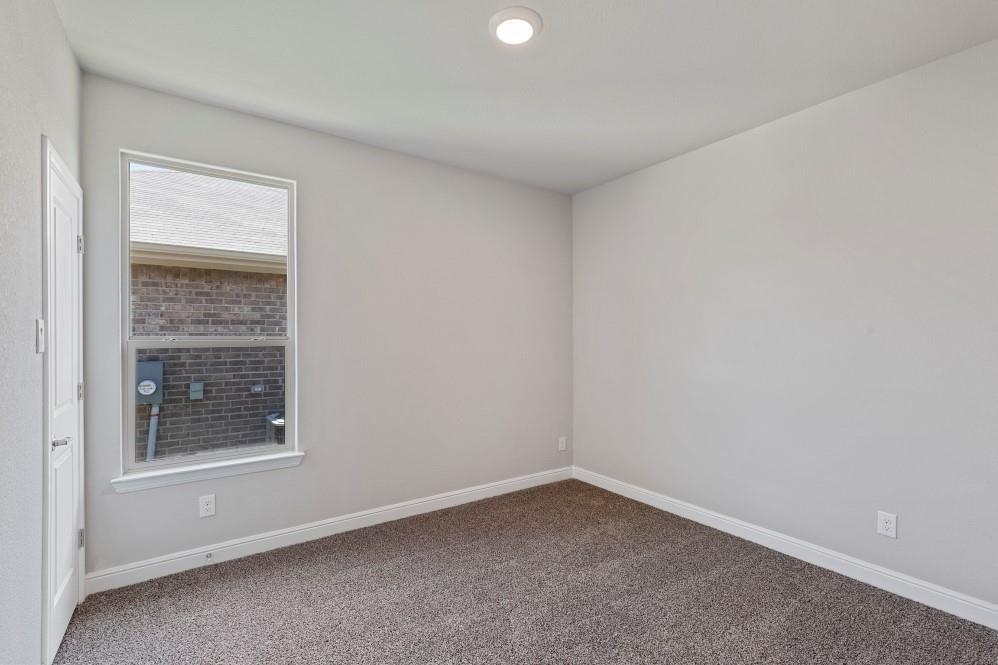 130 Lunayena Road Rhome, TX 76078 - Photo 28 of 39 an empty room with a window