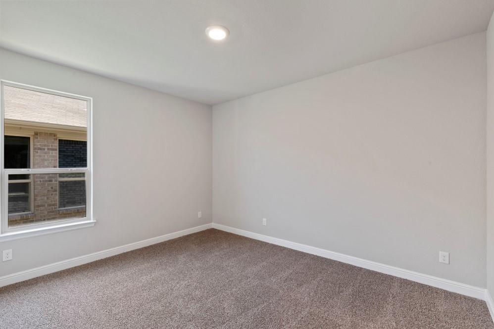 130 Lunayena Road Rhome, TX 76078 - Photo 31 of 39 an empty room with a window