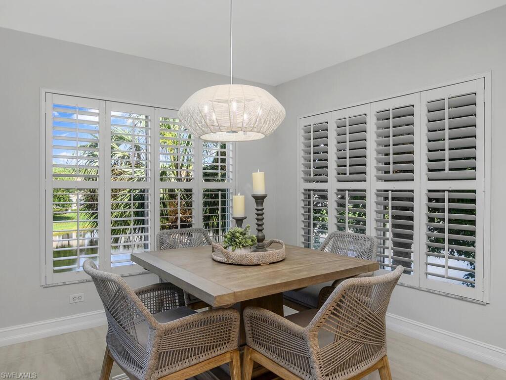 816 Carrick Bend Circle, Unit 202 Naples, FL 34110 - Photo 27 of 50 Dining space