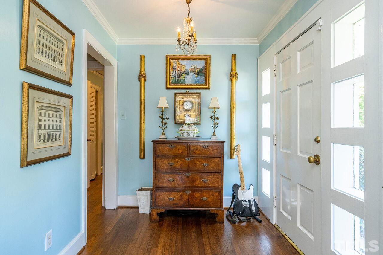 2613 Churchill Road Raleigh, NC 27608 - Photo 3 of 24 a view of an entryway with wooden floor