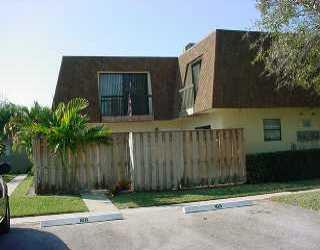 110 North Delaware Boulevard Jupiter, FL 33458 - Photo 1 of 5 a front view of a house with a garden