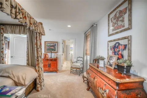 a bedroom with furniture and a bed