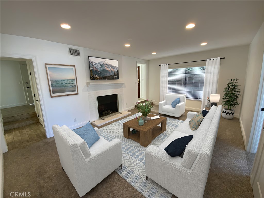 2137 Channel Road Newport Beach, CA 92661 - Photo 12 of 21 a living room with furniture and a fireplace
