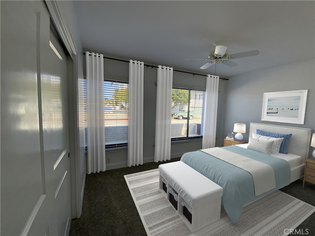 2137 Channel Road Newport Beach, CA 92661 - Photo 14 of 21 a bedroom with a large bed and a chandelier