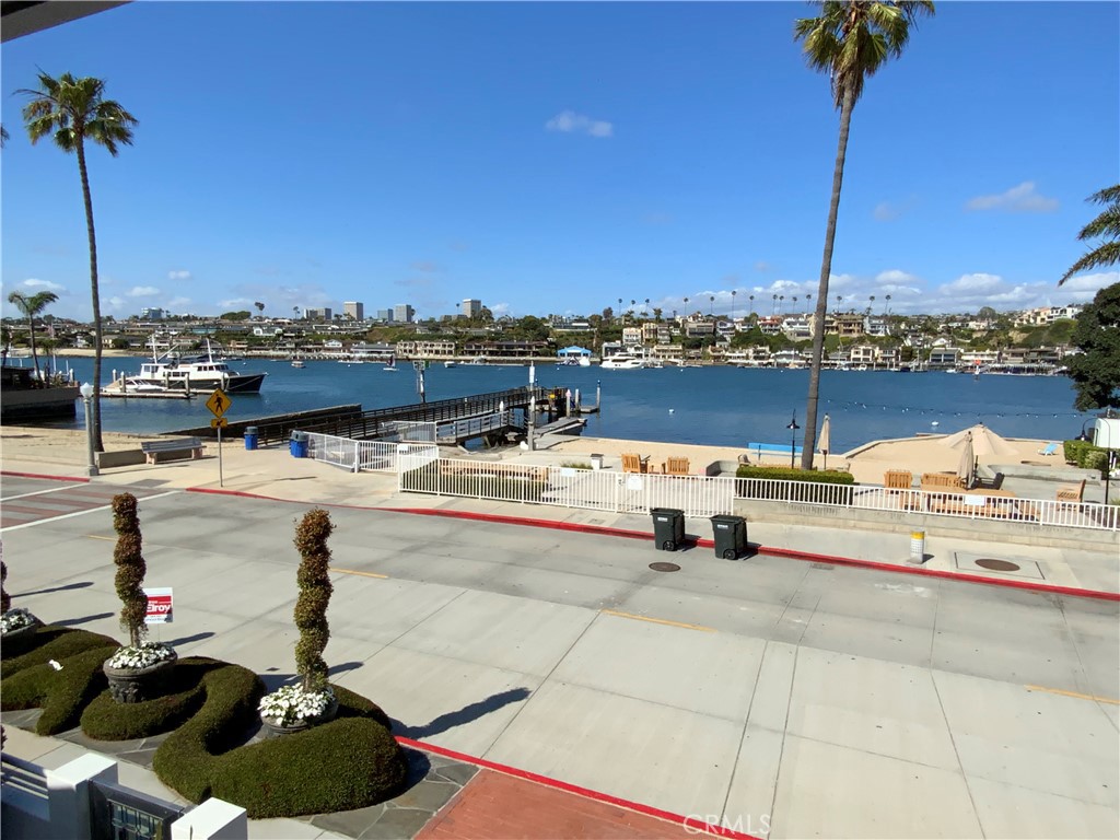 2137 Channel Road Newport Beach, CA 92661 - Photo 19 of 21 a view of roof deck with chairs and potted plants