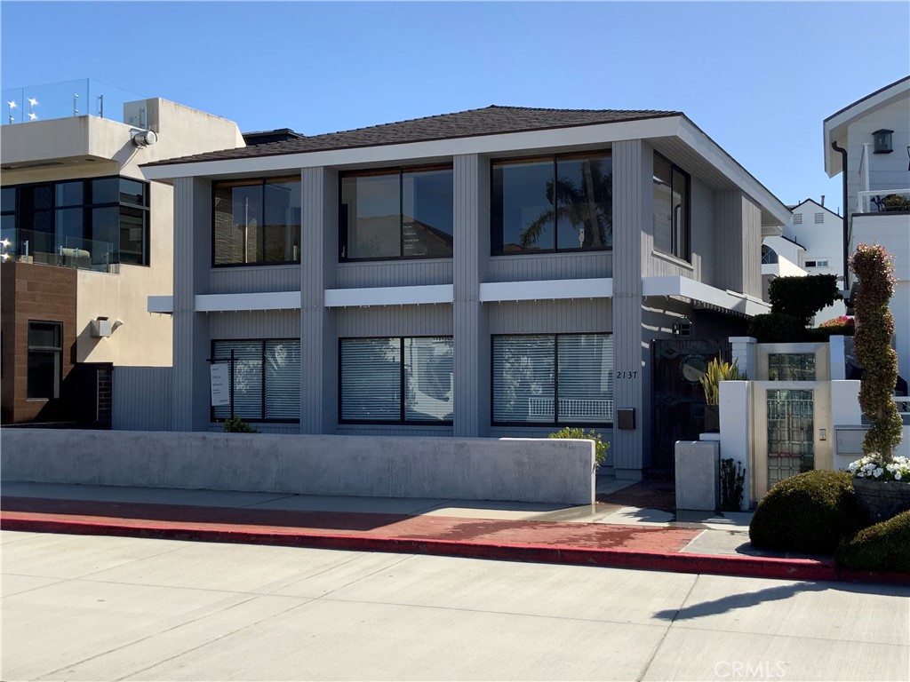 2137 Channel Road Newport Beach, CA 92661 - Photo 2 of 21 a view of a building with a window