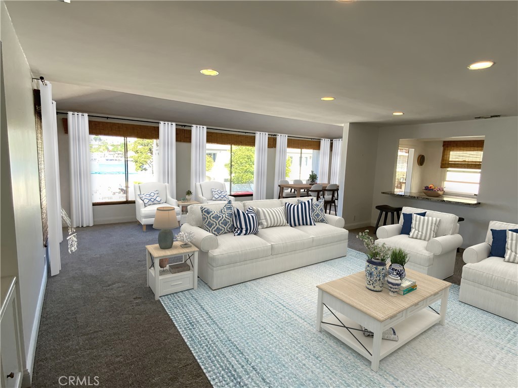 2137 Channel Road Newport Beach, CA 92661 - Photo 4 of 21 a living room with furniture and a large window