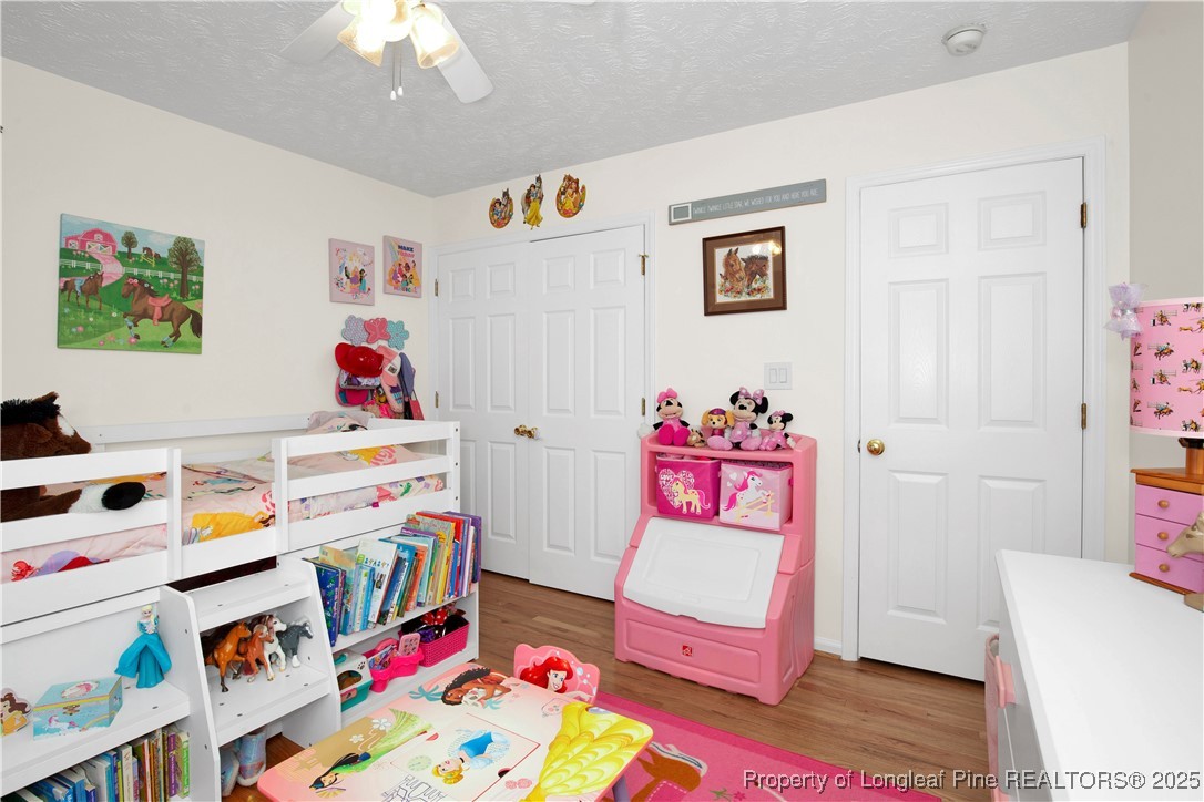 4891 Wade-Stedman Road Wade, NC 28395 - Photo 25 of 46 a room with toys and a couch