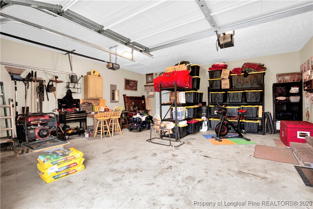 4891 Wade-Stedman Road Wade, NC 28395 - Photo 45 of 46 a view of a storage room with lot of stuff