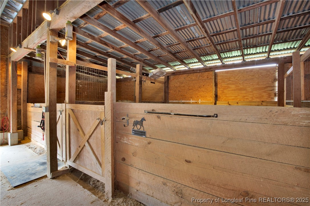 4891 Wade-Stedman Road Wade, NC 28395 - Photo 5 of 46 a view of a garage