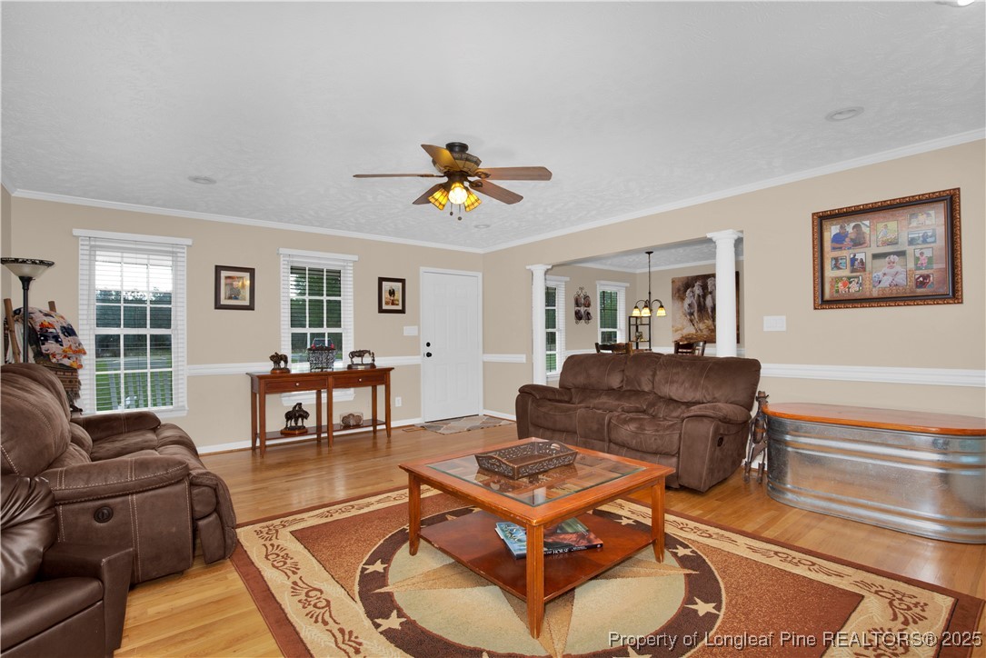 4891 Wade-Stedman Road Wade, NC 28395 - Photo 6 of 46 a living room with furniture a table and a window