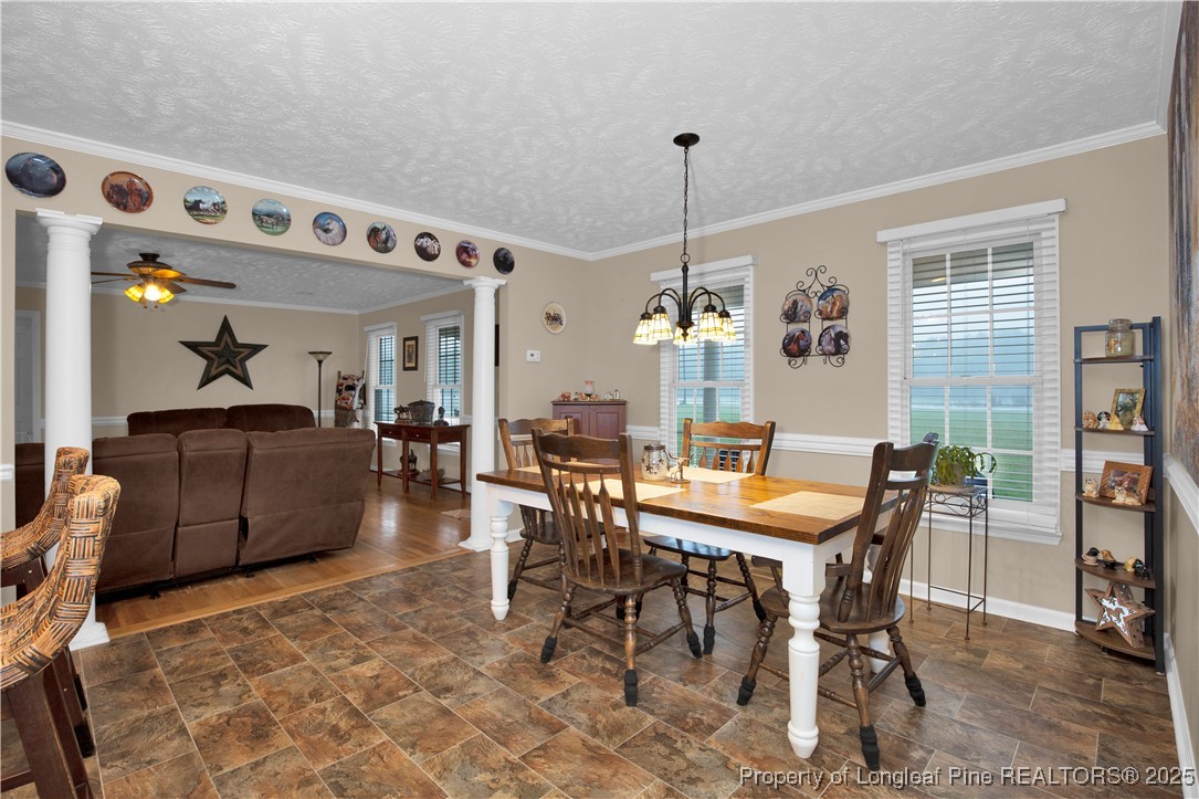 4891 Wade-Stedman Road Wade, NC 28395 - Photo 10 of 46 a view of a dining room with furniture