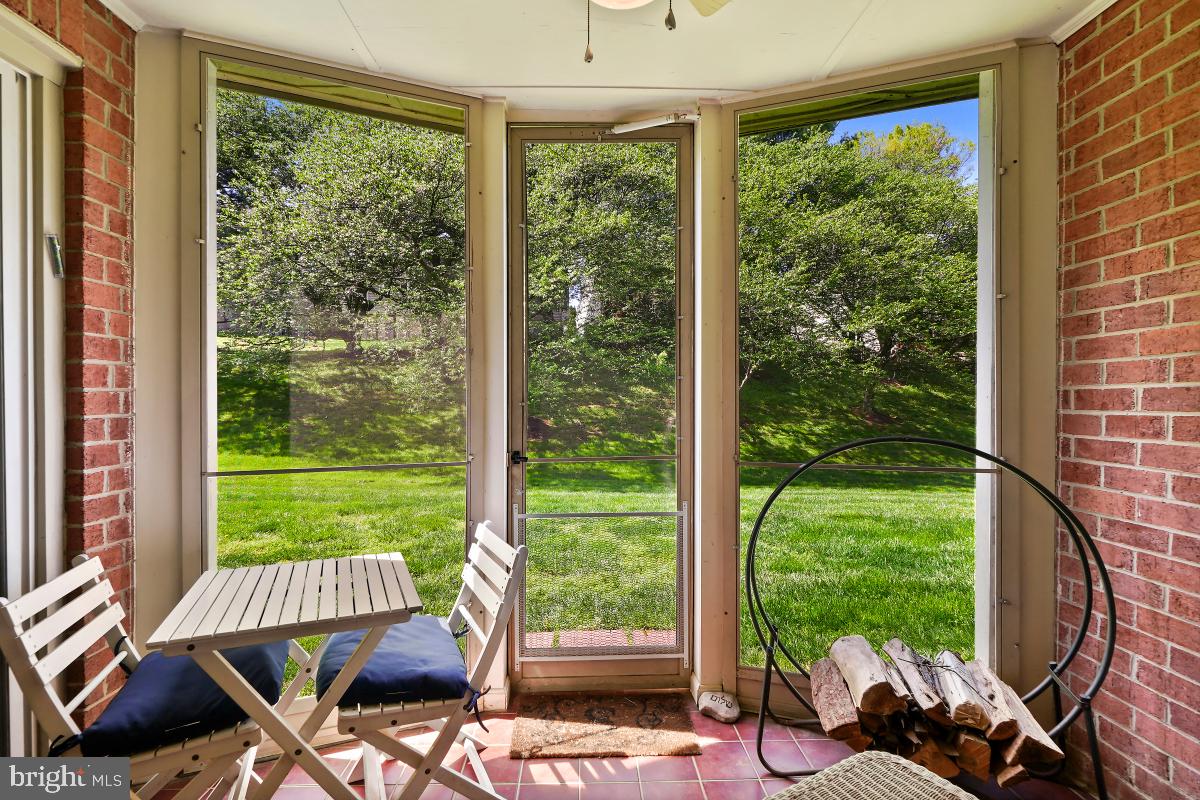 804 Amber Tree Court, Unit 804103 Gaithersburg, MD 20878 - Photo 11 of 30 Screened in Porch facing beautiful Cherry Trees.
