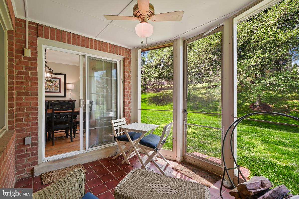 804 Amber Tree Court, Unit 804103 Gaithersburg, MD 20878 - Photo 12 of 30 Screened In Porch leading into Dining Room