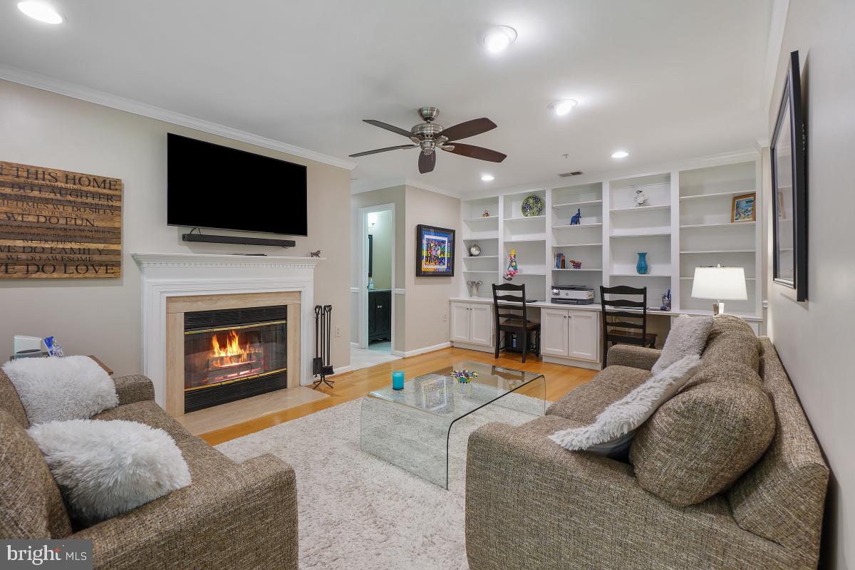 804 Amber Tree Court, Unit 804103 Gaithersburg, MD 20878 - Photo 13 of 30 Family Room and built-ins w/2 work areas.