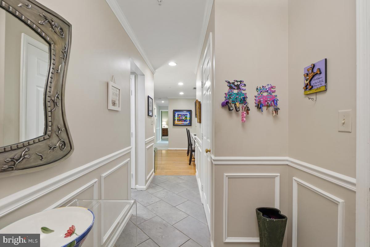 804 Amber Tree Court, Unit 804103 Gaithersburg, MD 20878 - Photo 4 of 30 Foyer facing Family Room
