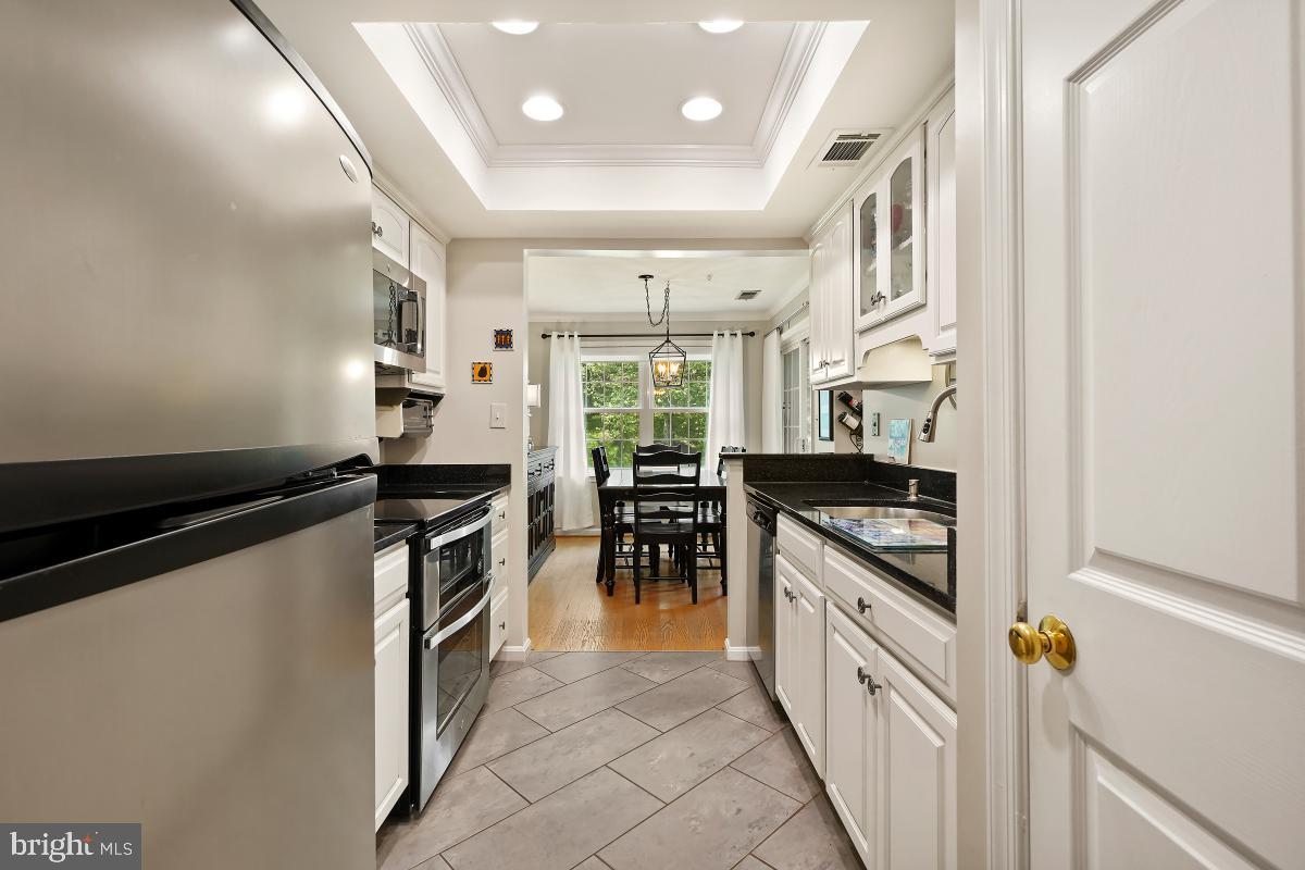 804 Amber Tree Court, Unit 804103 Gaithersburg, MD 20878 - Photo 5 of 30 Kitchen facing Dining Room