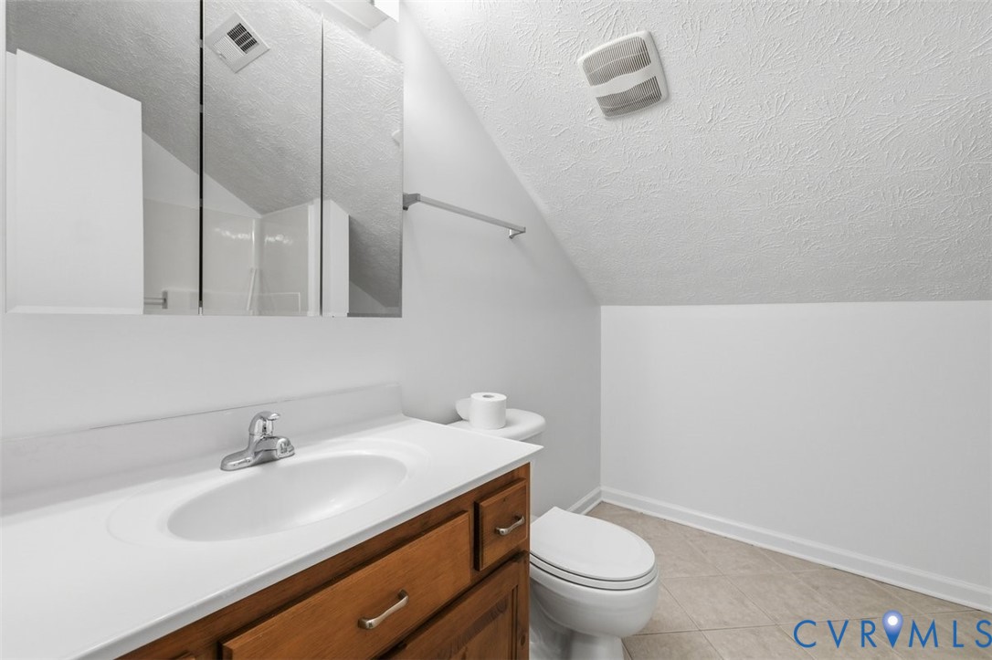18501 Branders Bridge Road Colonial Heights, VA 23834 - Photo 27 of 43 a bathroom with a sink and a toilet