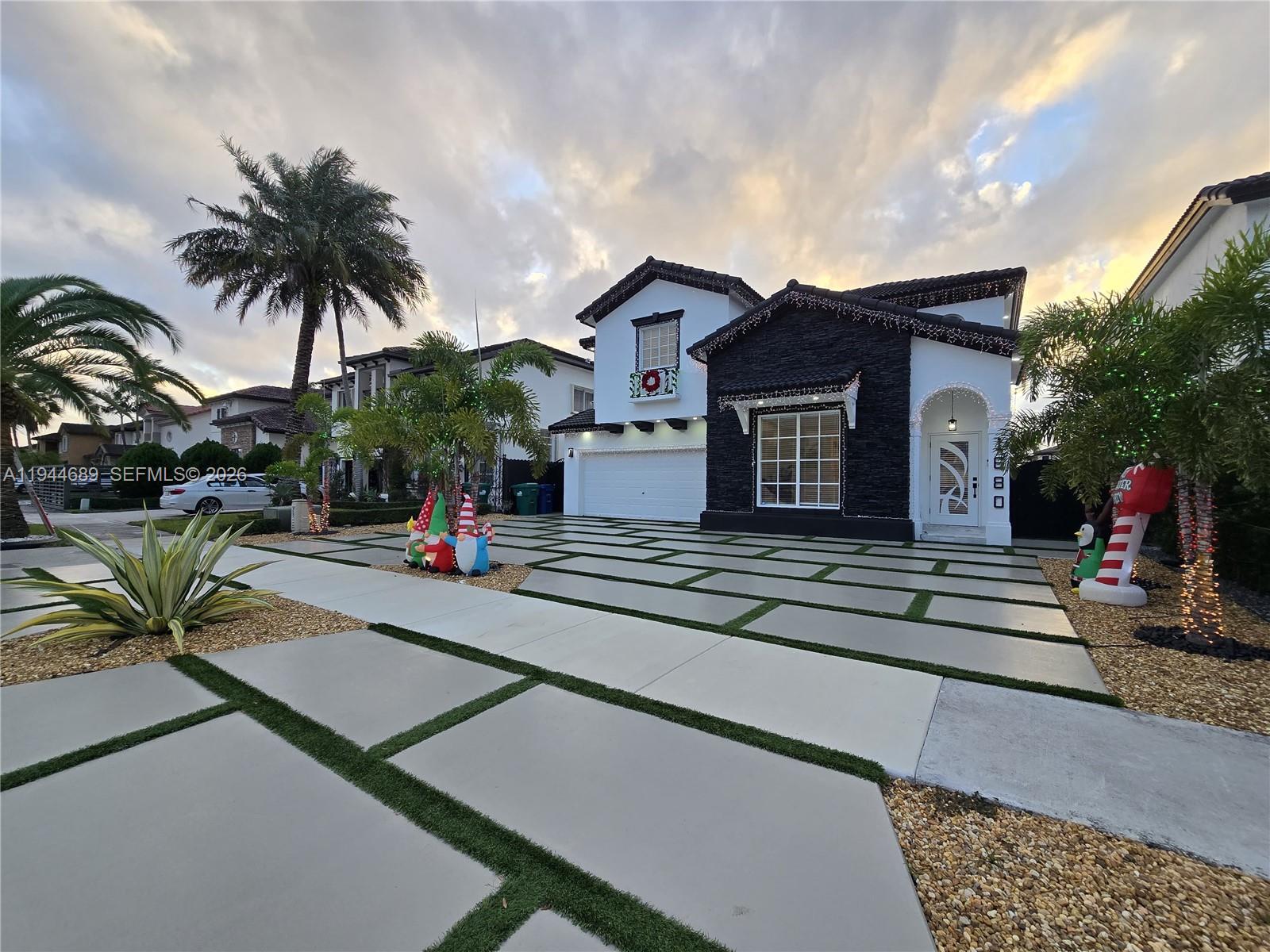 1680 Southwest 154th Path Miami, FL 33185 - Photo 73 of 100 a house view with a outdoor space