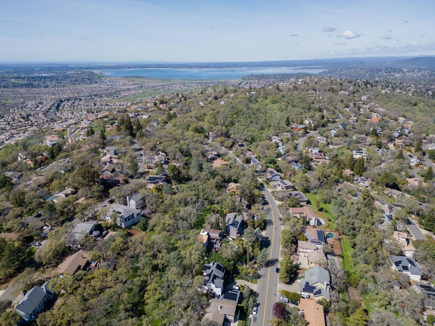 3518 Ridgeview Drive El Dorado Hills, CA 95762 - Photo 1 of 6 an aerial view of a house with a yard and mountain view in back