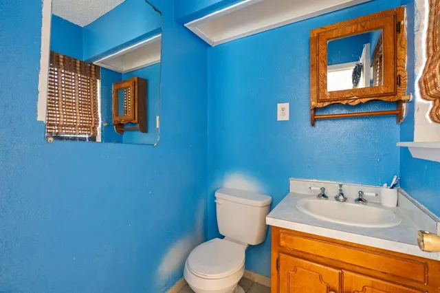 a bathroom with a sink and a toilet