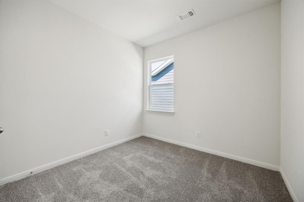 9908 Fighting Falcon Way Fort Worth, TX 76131 - Photo 11 of 22 a view of an empty room and a window