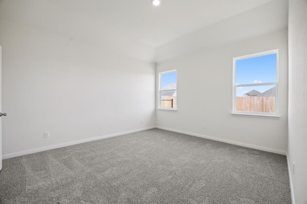 9908 Fighting Falcon Way Fort Worth, TX 76131 - Photo 17 of 22 an empty room with windows