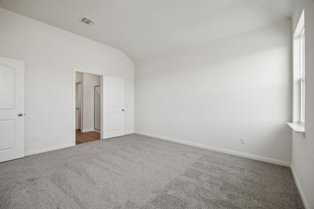 9908 Fighting Falcon Way Fort Worth, TX 76131 - Photo 18 of 22 a view of an empty room and window