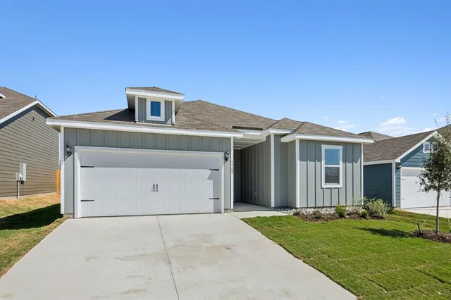 a front view of house with yard