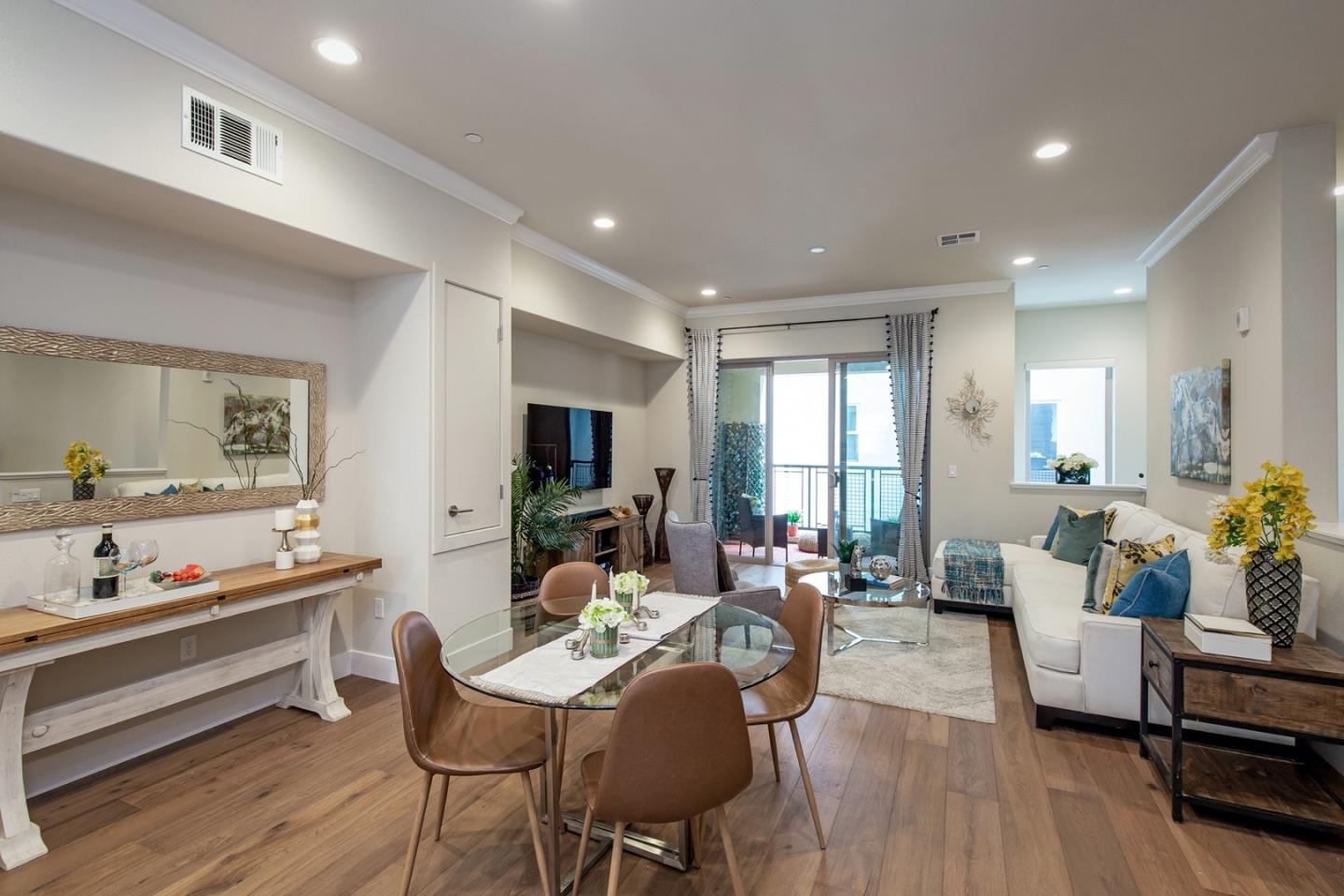 1728 Hazelnut Lane Milpitas, CA 95035 - Photo 1 of 1 a living room with furniture and a wooden floor