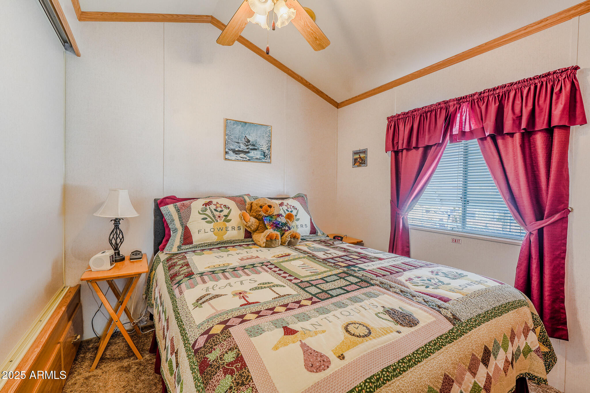 21282 Escapees Way, Unit 409 Congress, AZ 85332 - Photo 12 of 33 a bedroom with a bed and a window