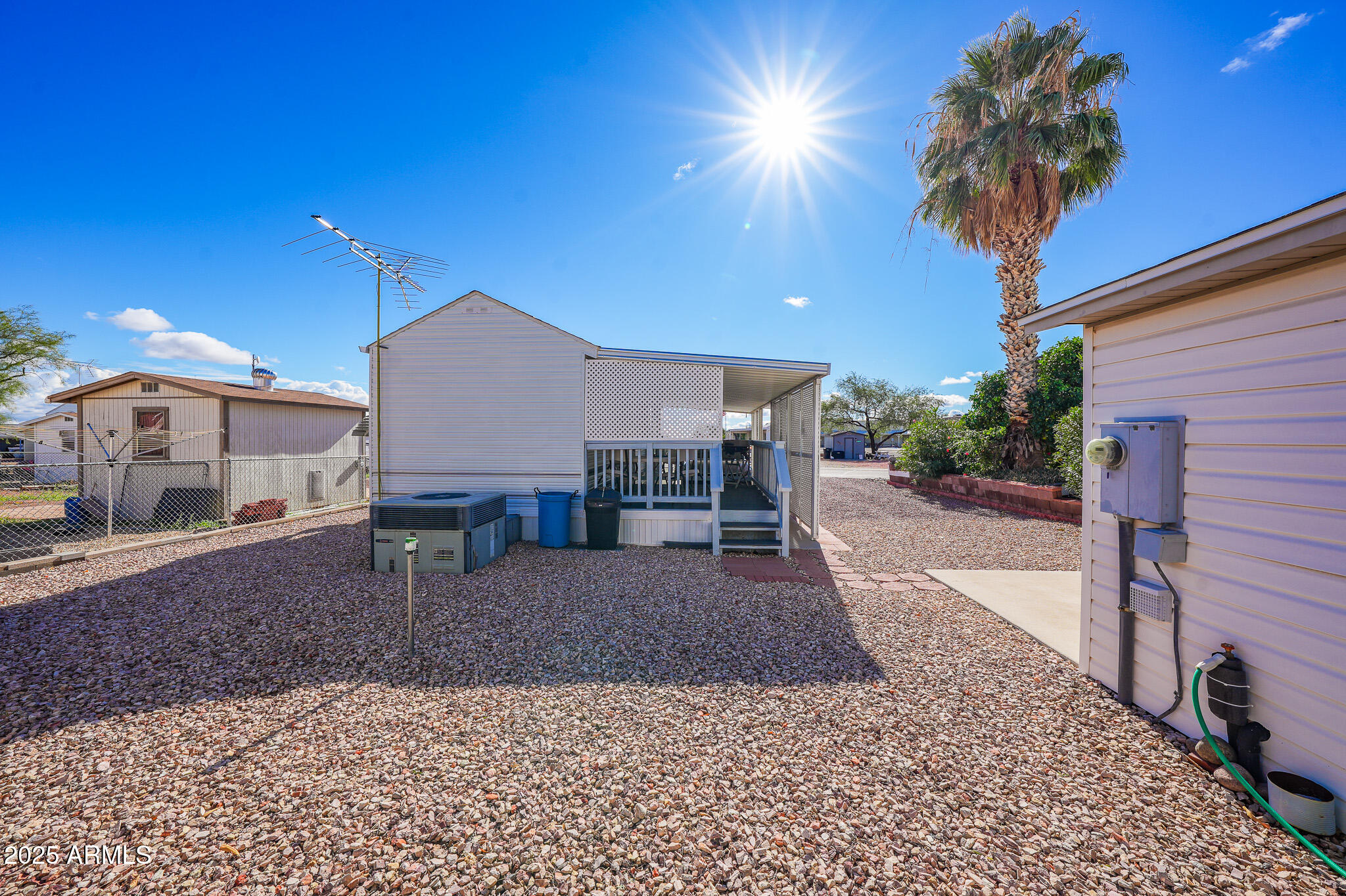 21282 Escapees Way, Unit 409 Congress, AZ 85332 - Photo 20 of 33 a house view with a backyard space