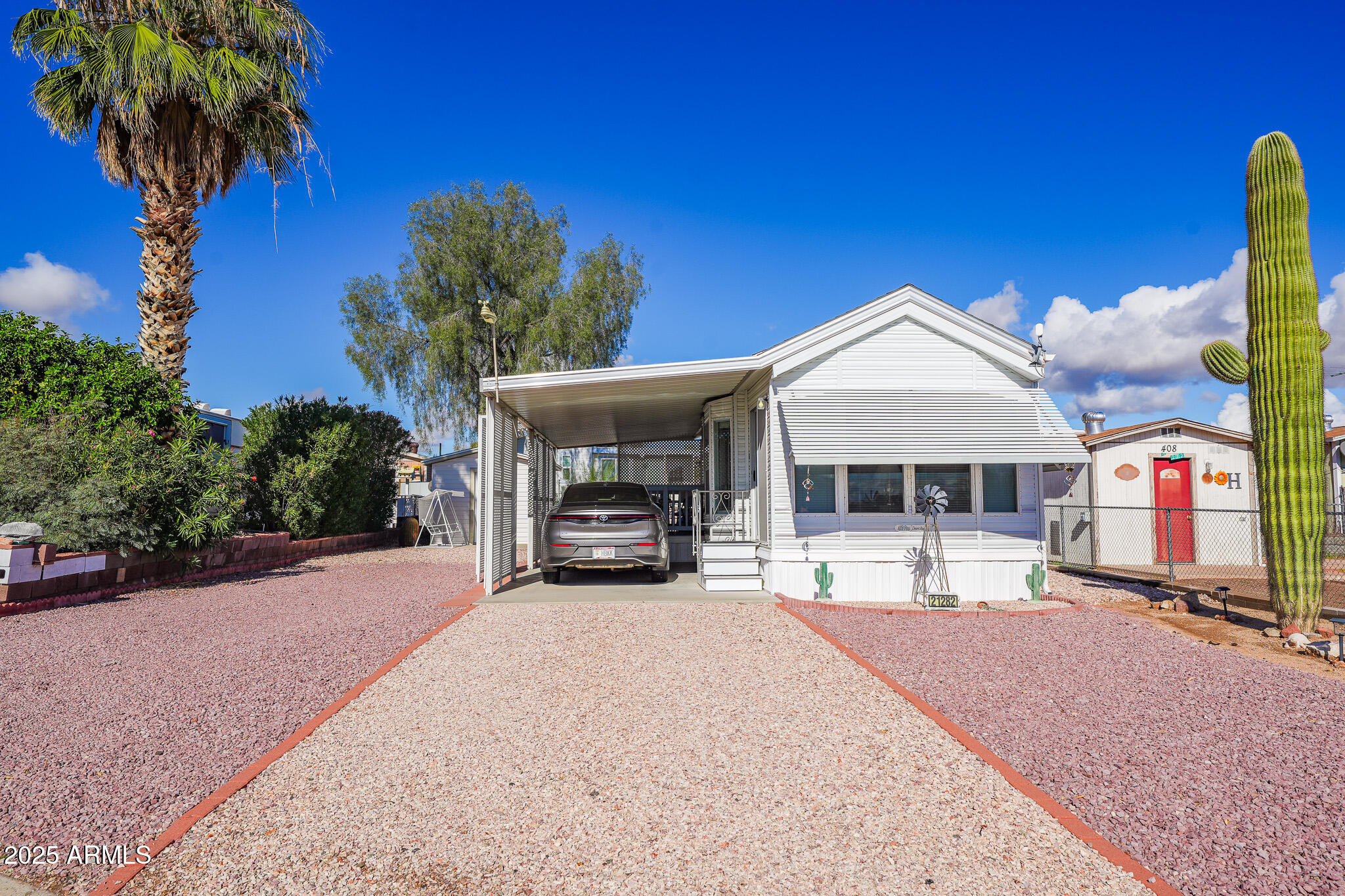 21282 Escapees Way, Unit 409 Congress, AZ 85332 - Photo 2 of 33 a view of a house with a patio