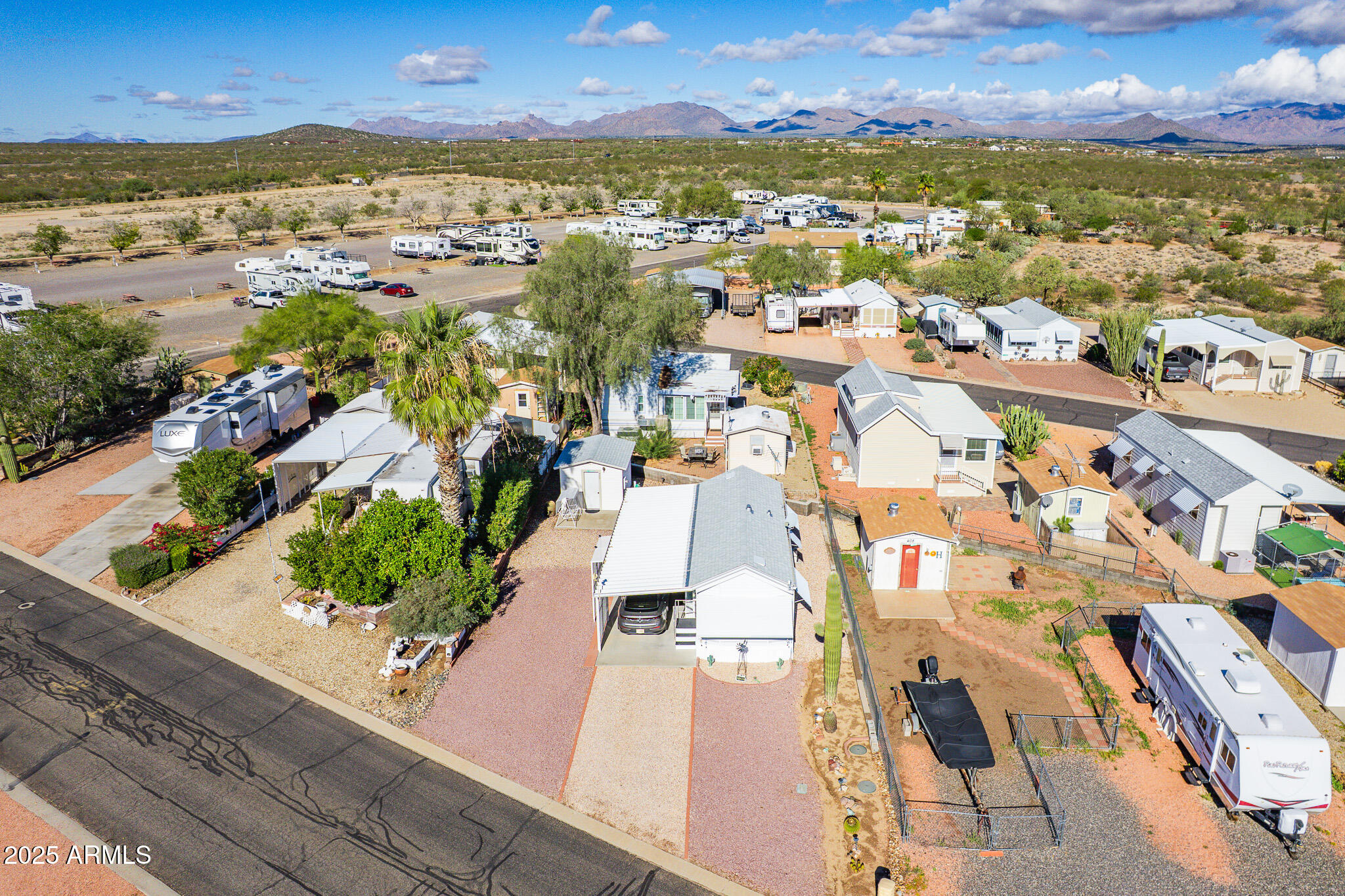 21282 Escapees Way, Unit 409 Congress, AZ 85332 - Photo 25 of 33 an aerial view of residential houses with outdoor space