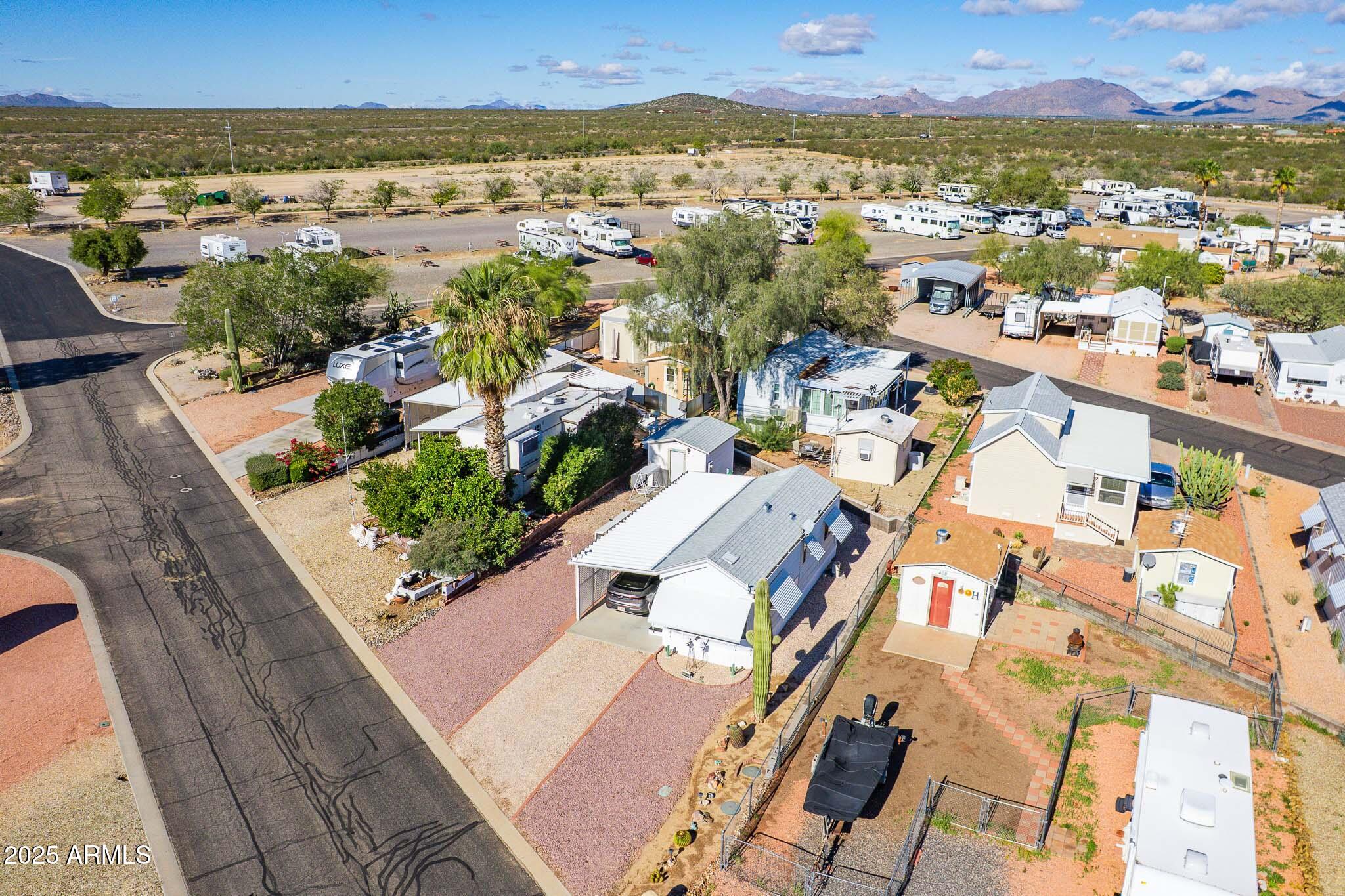 21282 Escapees Way, Unit 409 Congress, AZ 85332 - Photo 26 of 33 an aerial view of residential houses with outdoor space