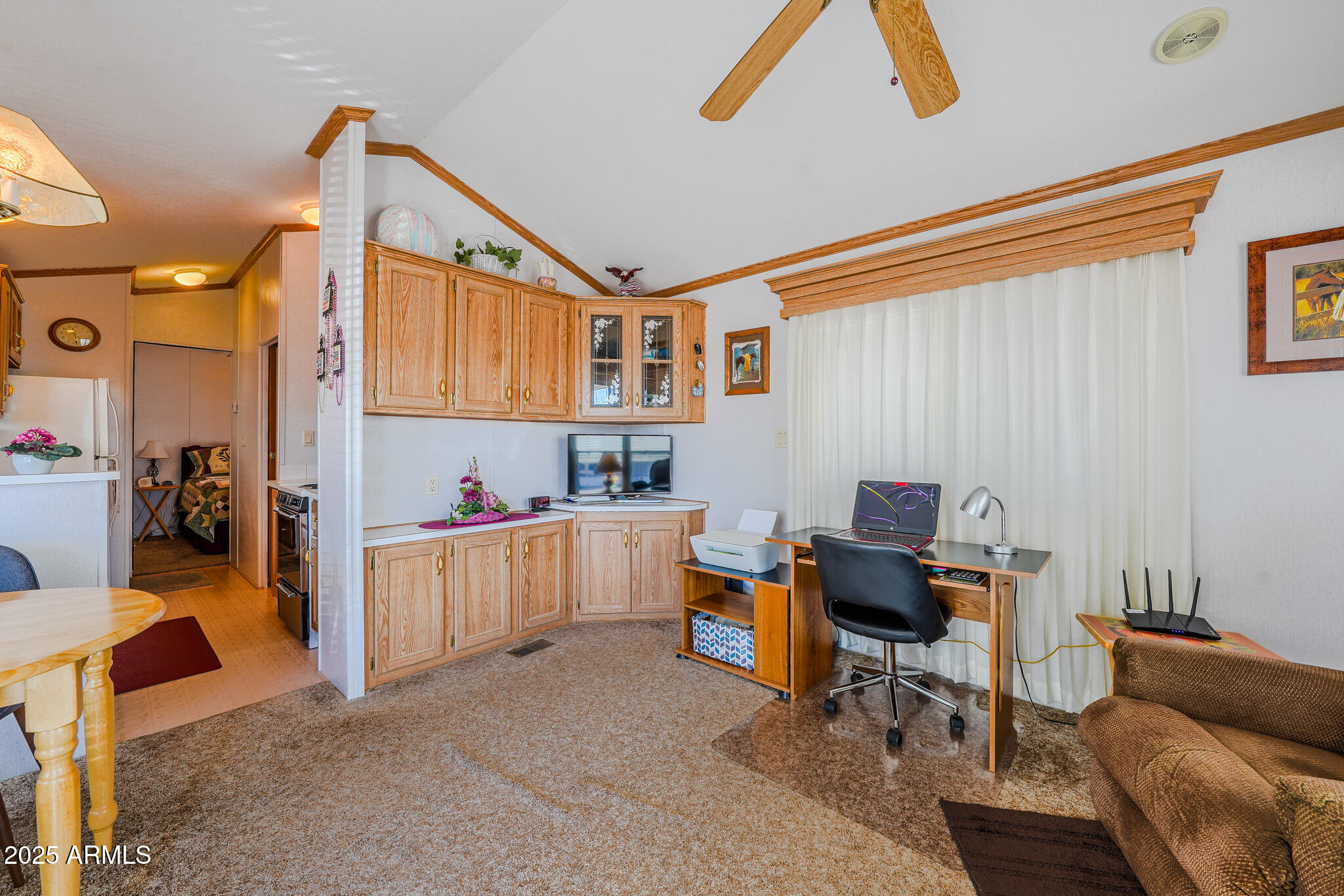 21282 Escapees Way, Unit 409 Congress, AZ 85332 - Photo 6 of 33 a workspace with furniture and window