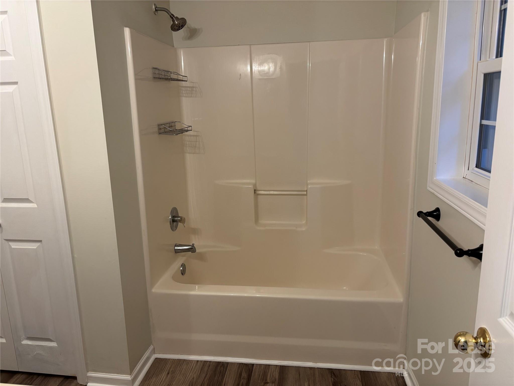 994 Wilma Sigmon Road Lincolnton, NC 28092 - Photo 11 of 15 a bathroom with a bathtub and a shower