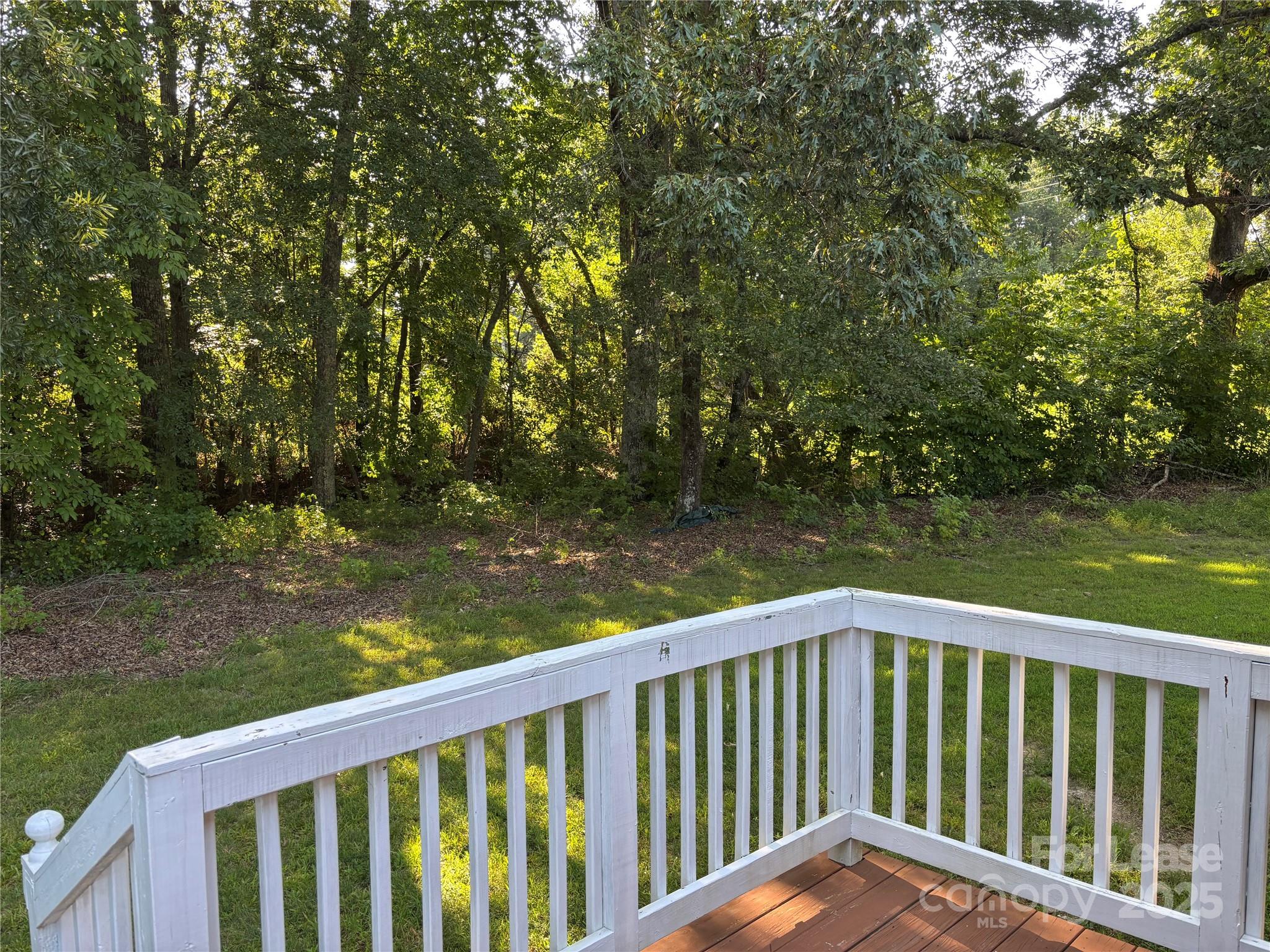 994 Wilma Sigmon Road Lincolnton, NC 28092 - Photo 13 of 15 a balcony with trees in front of it
