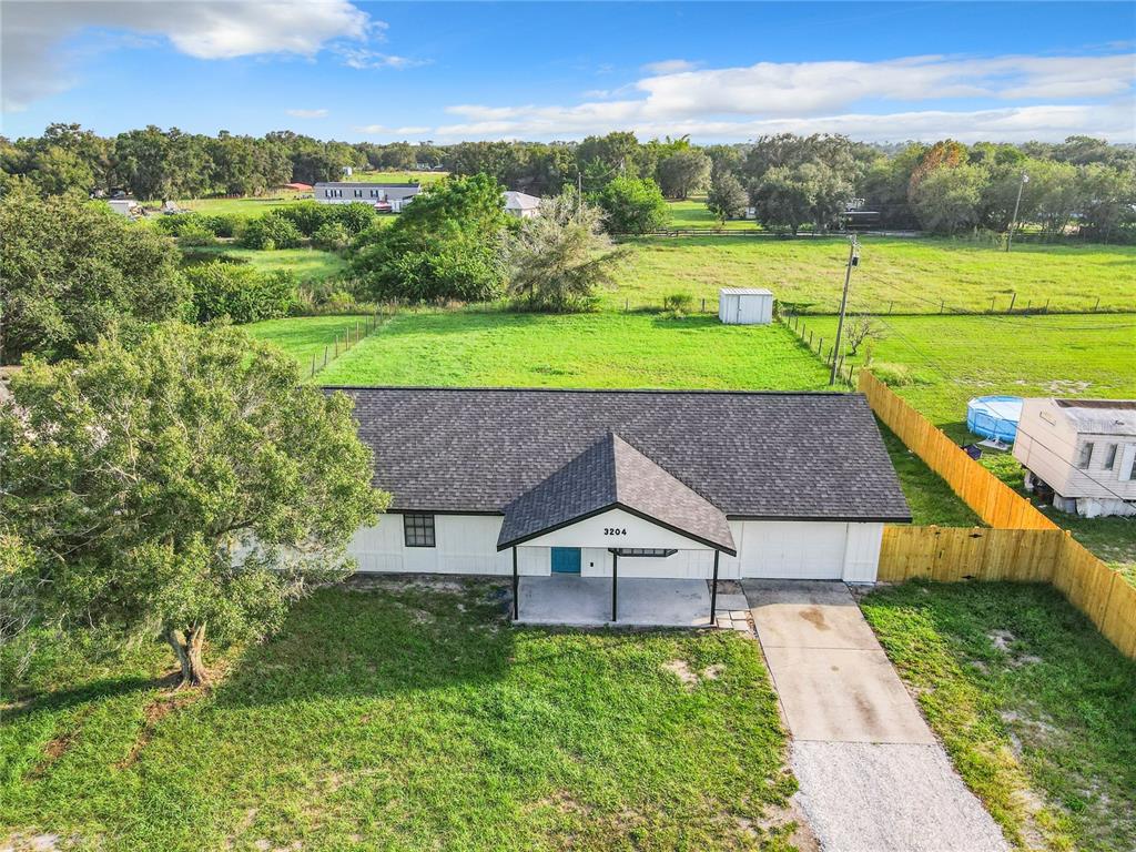 3204 Spring Lake Road Lake Wales, FL 33898 - Photo 1 of 1 an aerial view of a house with big yard