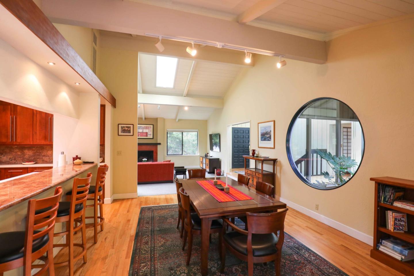 16 Westwood Road Santa Cruz, CA 95060 - Photo 11 of 46 a dining room with furniture and a wooden floor