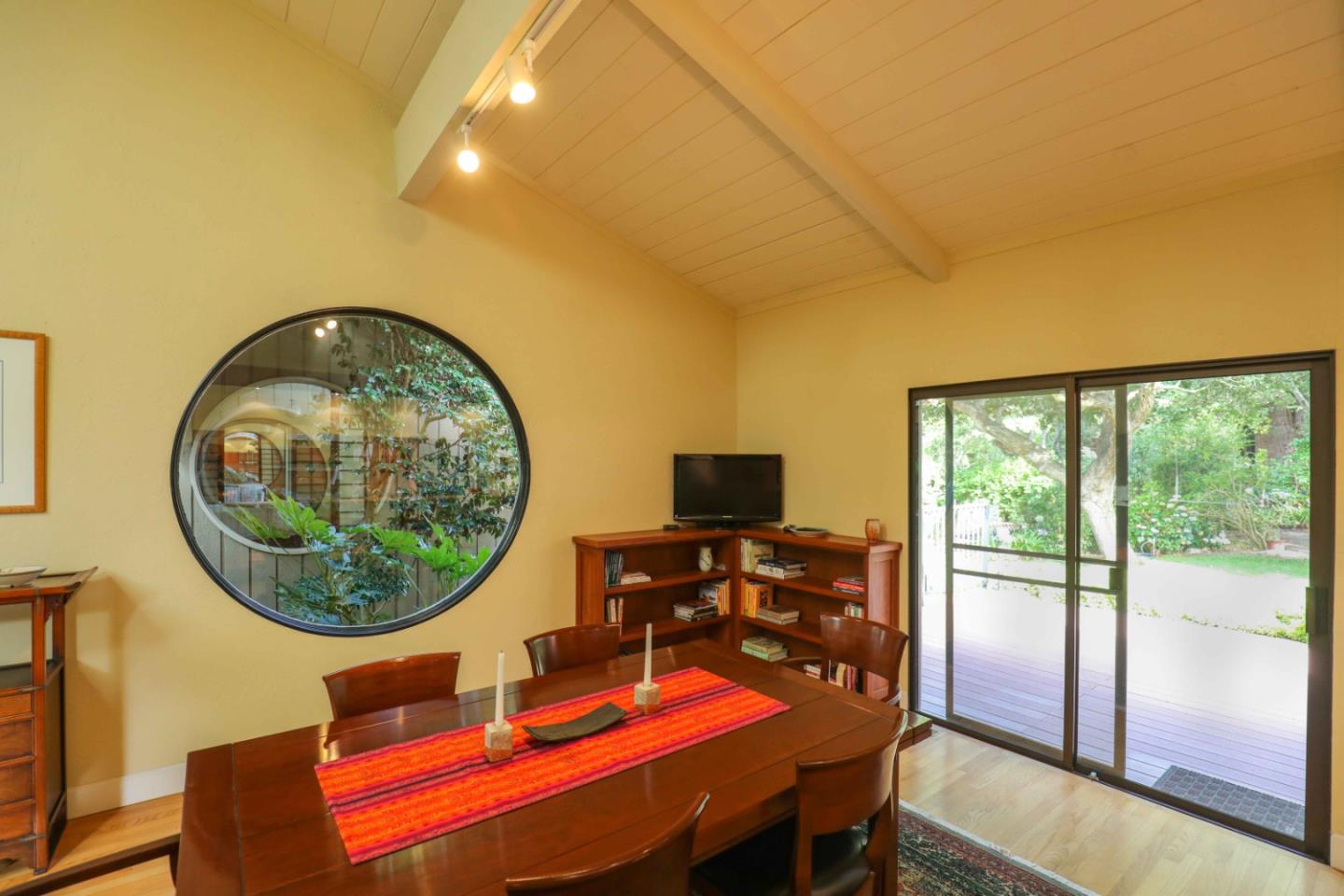 16 Westwood Road Santa Cruz, CA 95060 - Photo 13 of 46 a dining room with a table and chairs