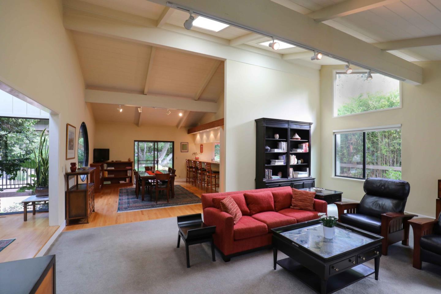 16 Westwood Road Santa Cruz, CA 95060 - Photo 18 of 46 a living room with furniture a table and a large window
