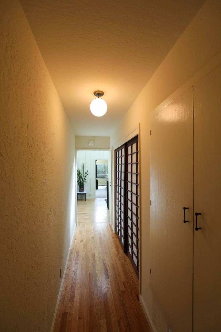 16 Westwood Road Santa Cruz, CA 95060 - Photo 36 of 46 a view of a hallway with wooden floor