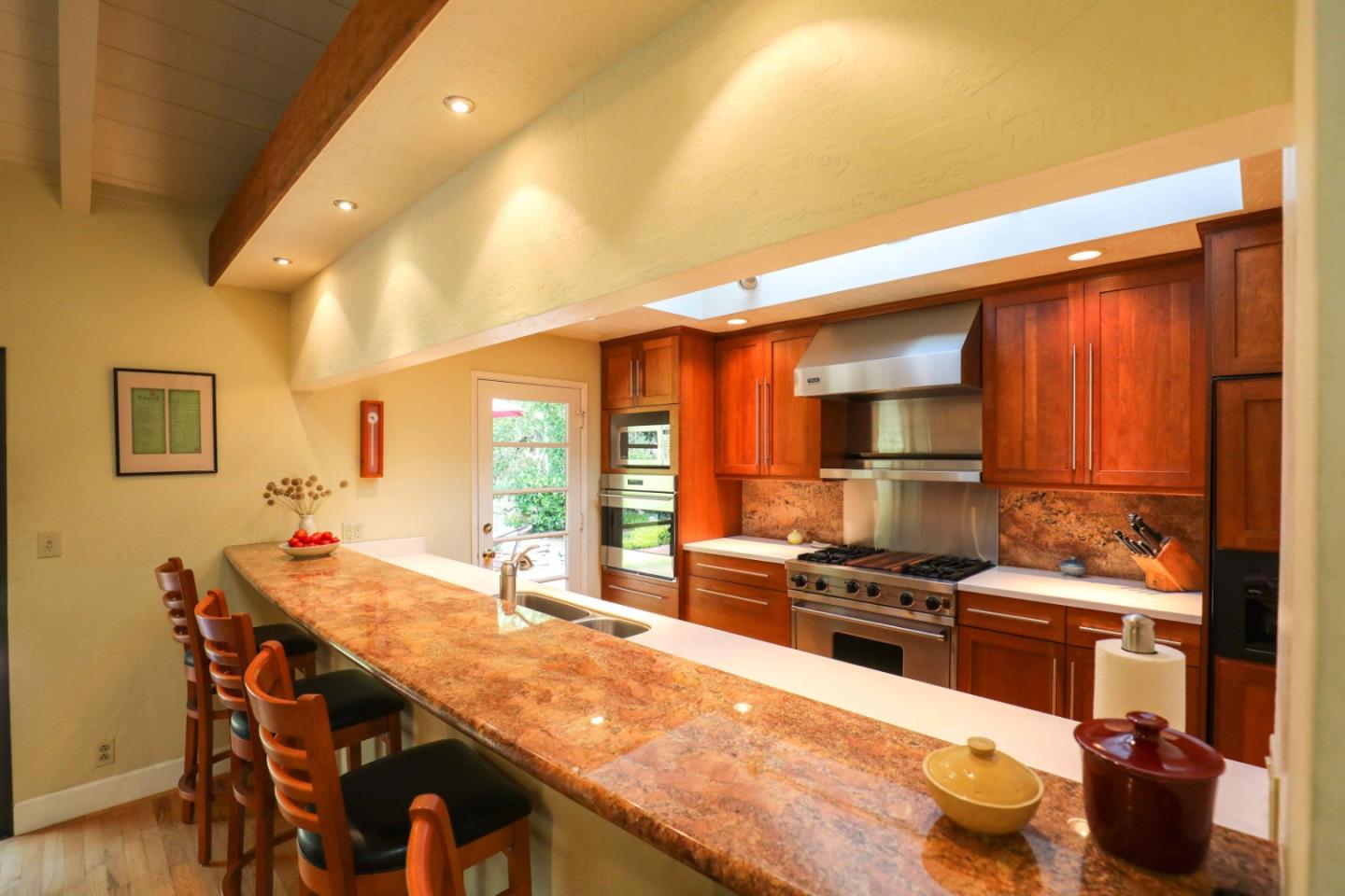 16 Westwood Road Santa Cruz, CA 95060 - Photo 4 of 46 a kitchen with stainless steel appliances kitchen island granite countertop a sink and cabinets