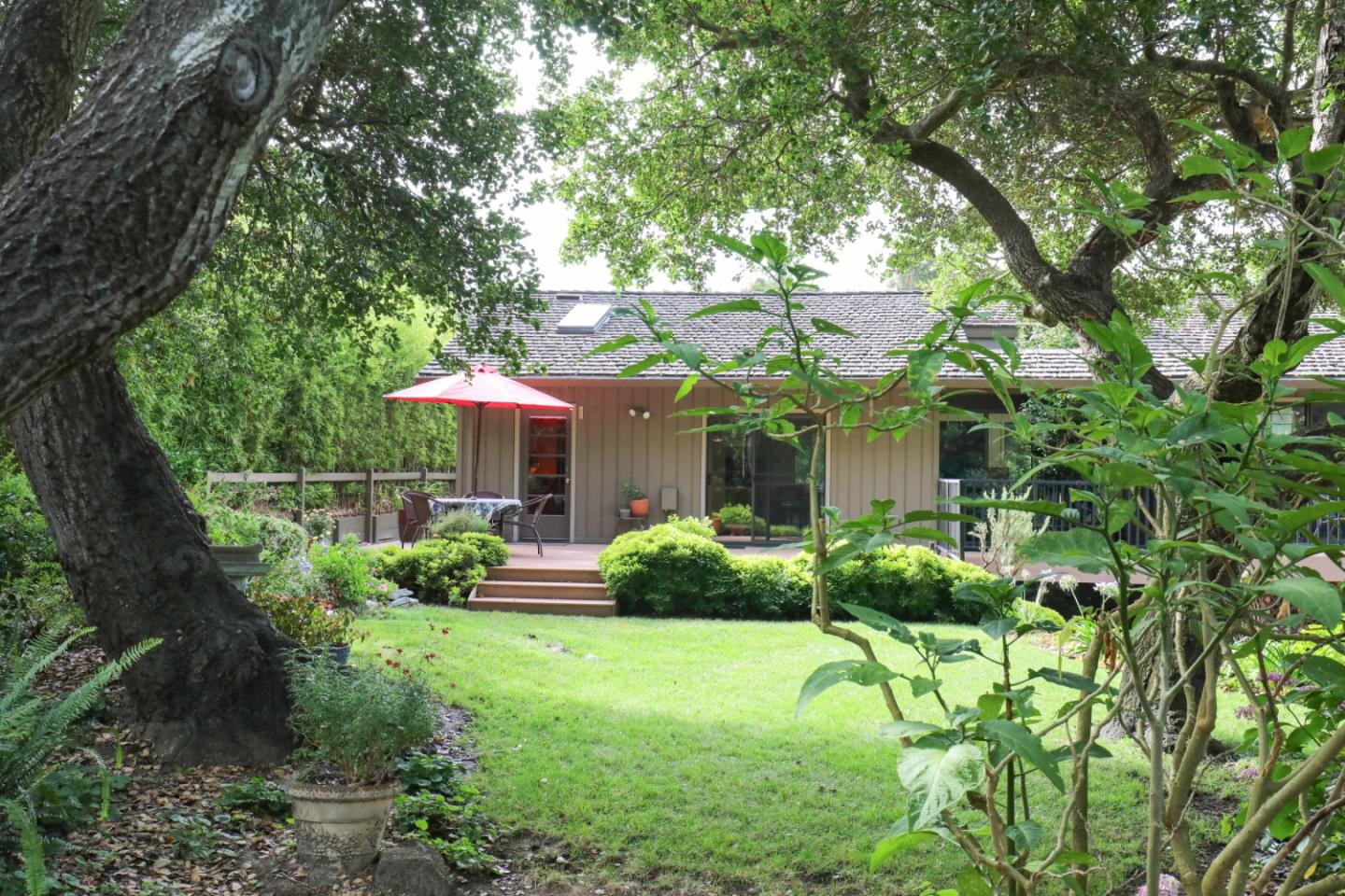 16 Westwood Road Santa Cruz, CA 95060 - Photo 41 of 46 a front view of a house with a yard and a large tree