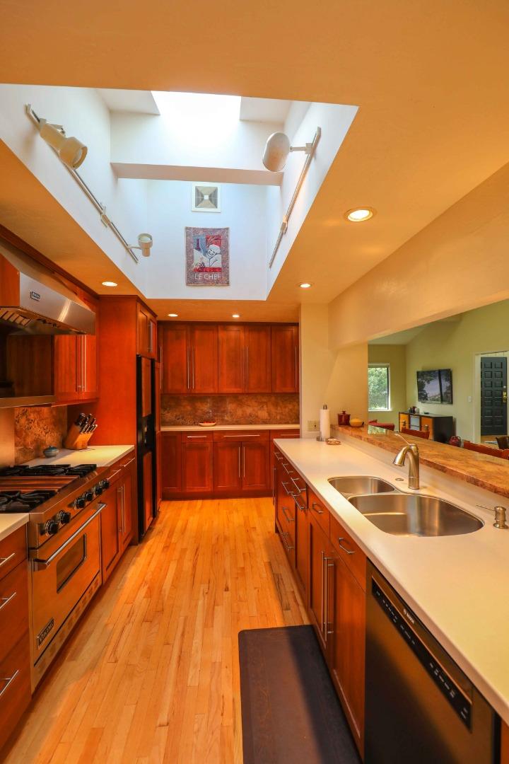 16 Westwood Road Santa Cruz, CA 95060 - Photo 7 of 46 a kitchen with stainless steel appliances a sink and a stove