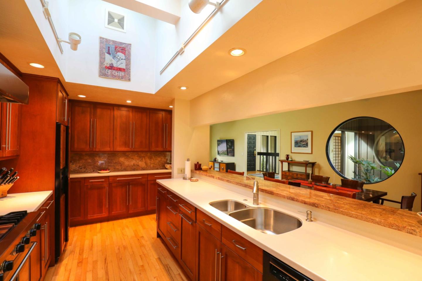 16 Westwood Road Santa Cruz, CA 95060 - Photo 8 of 46 a kitchen with stainless steel appliances a sink and a wooden cabinets