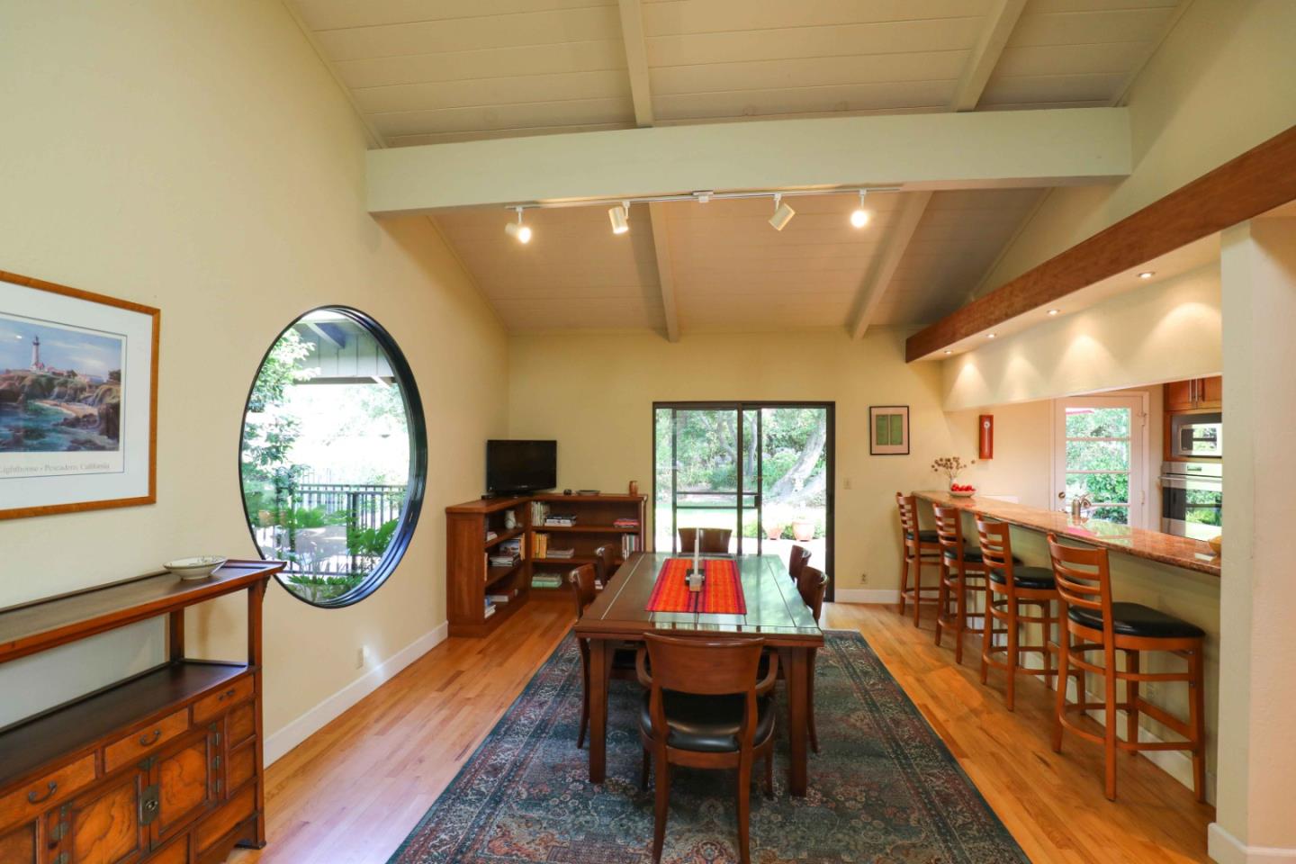 16 Westwood Road Santa Cruz, CA 95060 - Photo 10 of 46 a living room with furniture a large window with wooden floor