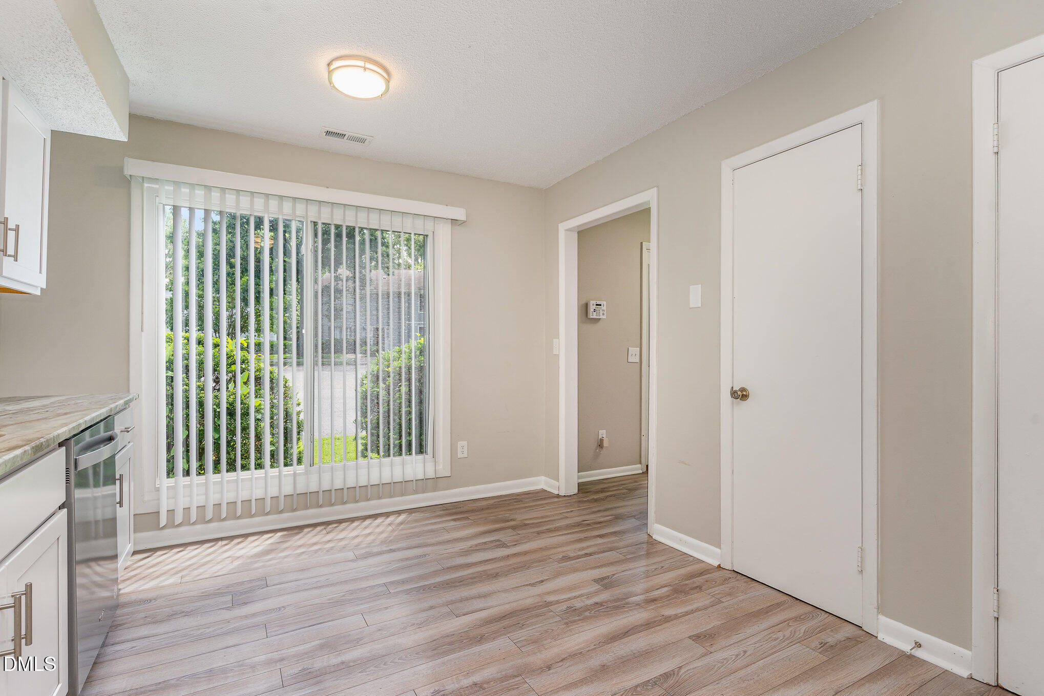 1304 Seaton Road, Unit 1 Durham, NC 27713 - Photo 7 of 20 a view of entryway with wooden floor